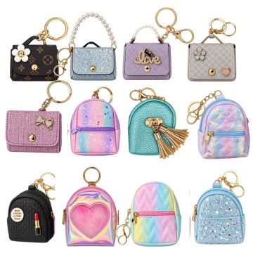 JUG JYJ JULIANA LLAVERO CARTERA/MOCHILA